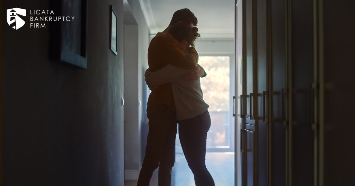 Couple embracing in their home